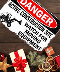 Funny Metal Sign Danger Active Construction Site Aluminum Sign 8x12 Inch on wooden surface with gifts and decor
