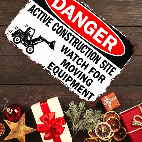 Funny Metal Sign Danger Active Construction Site Aluminum Sign 8x12 Inch on wooden surface with gifts and decor