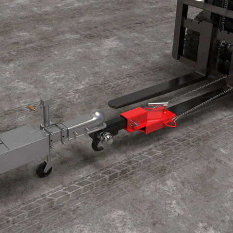 Heavy Duty Universal 2 Inch Forklift Trailer Hitch Adapter With Dead Simple Clamp On Grip For Lightning Fast Pallet Fork Ball Mount Rigging And Zero Fuss Job Site Setup connected to fork at a construction site.