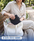 Person placing 16 Slot 30ml Vial Case For Bac Water And Peptide Reconstitution into a white tote bag outdoors.