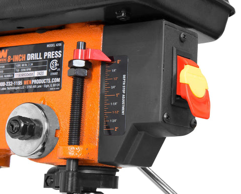 Smooth Rolling Five Speed Benchtop Drill Press Packing A Beefy 2.3 Amp Motor And Sturdy Cast Iron Base showing depth stop adjustment and controls.