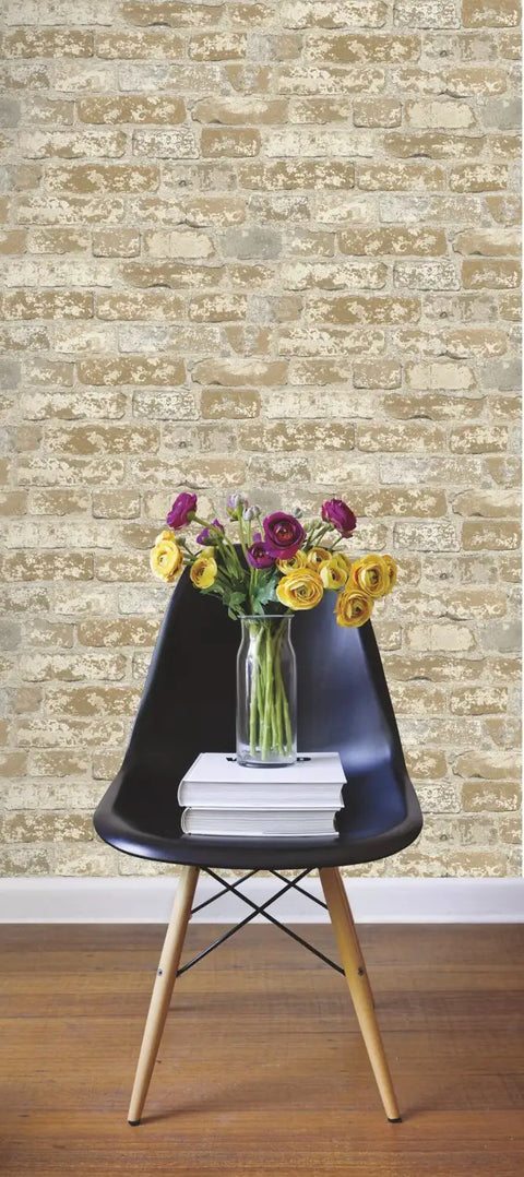 Red Stuccoed Brick Peel And Stick Wallpaper Roll For Quick And Easy Accent Wall Removable No Mess Repositionable Washable And Strippable Thick Durable Vinyl No Residue Left Behind on wall behind chair and flowers