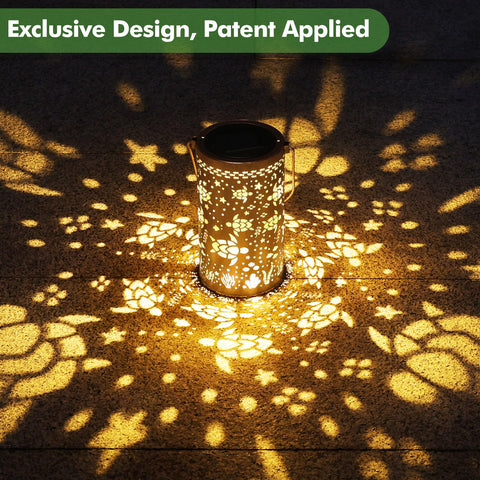 Sea Turtle Solar Lantern Outdoor Light Hanging LED Waterproof Garden Decor casting floral patterns on ground at night