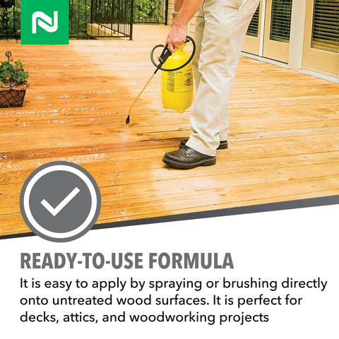 Person applying Penetrating Wood Preservative And Termiticide For Termites Carpenter Ants And Wood Boring Beetles on deck