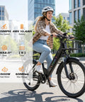 Badass Electric Bike For Adults With 750W Peak Motor Crushing Hills At 20 Mph, 26 Inch Fat Tire Ebike shown in urban setting, rider smiling.