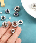 Close-up of Rock Solid Left Hand Reverse Nuts M8x1.25mm 304 Stainless Steel Serrated Flange Hardware in hand, five pack.