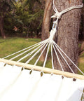 Tree Swing Straps And Hammock Rope Kit, 13 Ft Each With Heavy Duty Carabiner Hooks attached to a tree, outdoors