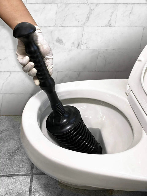 High Flow Toilet Plunger For 1.6 Gallon Low Flush Toilets With Funnel Nose Design 90 Degree Seal in use on toilet bowl