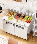 Heavy Duty Commercial Sandwich And Salad Prep Refrigerator With 48 Inch Double Doors Stainless Steel Worktop And 12 Pan Trays, filled with fresh ingredients.
