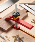 Heavy Duty Adjustable T Track Clamp With Micro Fine Tuning For Woodworking, red clamp securing wood on workbench.