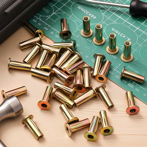 100 Pcs 1/4-20 Rivet Nuts Multi Grip Threaded Insert Nut Kit Zinc Plated Steel Flat Head Nutserts on a workbench