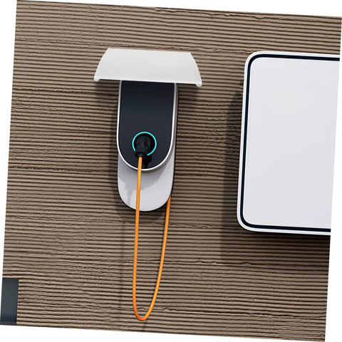 Heavy Duty Outdoor EV Charger Enclosure Weatherproof Rain Shell For Your Electric Vehicle Plug With Rock Solid UV Guard and Super Quick Install, mounted on wall with charging cable.