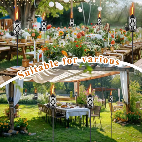 Image of Six Pack Glass Citronella Torches For Outdoor Use 16 Oz Fuel 55 Inch Clear Glass Torches With 3 Prong Grounded Stakes For Garden Patio Lawn Party And Landscape Decor, shown lighting a garden event.