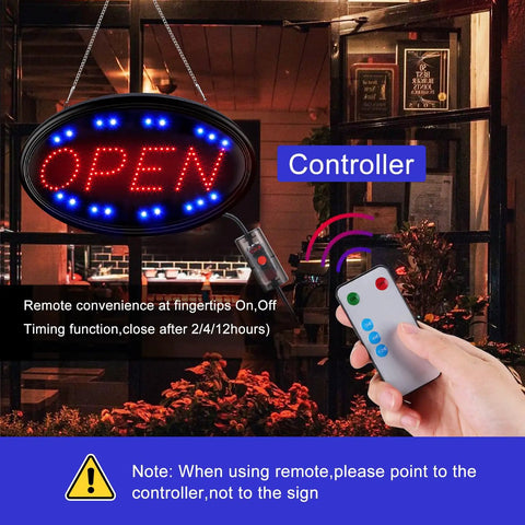 Led Open Sign 23 By 14 Inch With Remote Control Ultra Bright in window, hand holding remote showing control functionality
