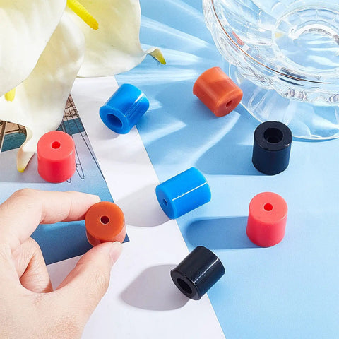 Multicolor Sixteen Piece Silicone Heatbed Mount Set for 3D Printers with 0.63x0.71 inch pads displayed on blue surface.