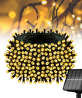 Outdoor Solar String Lights 39Ft 100 LED With 8 Modes Waterproof Warm White For Yard Fence Balcony Party And Christmas Tree Decor Energy Saving Solar Powered Easy Setup For A Cozy Vibe coiled on black cord with solar panel