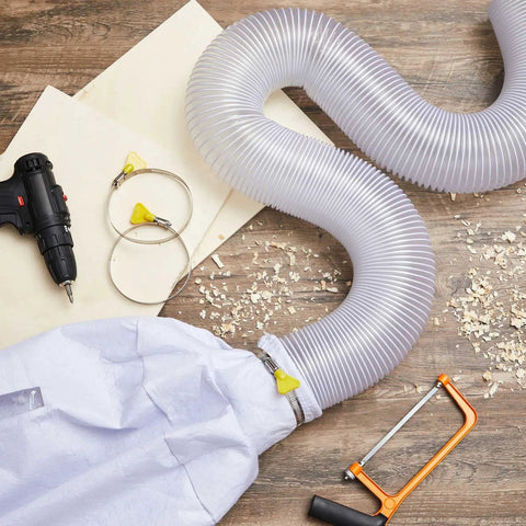 Dust Collection Kit With Heavy PVC 4 Inch Hose 10 Ft Long, 4 Hose Clamps And Dust Bag, tools on wooden surface