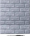 Grey Faux Brick Peel And Stick Wall Panels 3D Foam Brick Accent Cover Waterproof Durable with realistic texture shown with cutter.