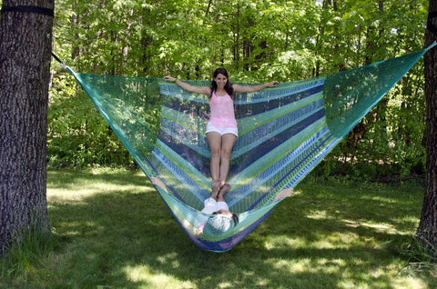 Jumbo Mayan Mexican Hammock For Big Groups And Families extra large hammock with people lounging in backyard