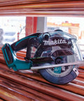 18V LXT Cordless Metal Cutting Saw Bare Tool With 5 3 8 Inch Cut Capacity on top of copper pipes