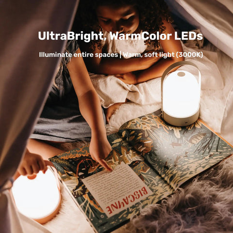 Child reading under tent lighted by Kin Portable Cordless Lantern Table Lamp With USB Rechargeable 4000mAh Battery For Indoor And Outdoor Lighting Kids Bedroom Lamp Easy Three Step Touch Dimmable UltraBright LED.