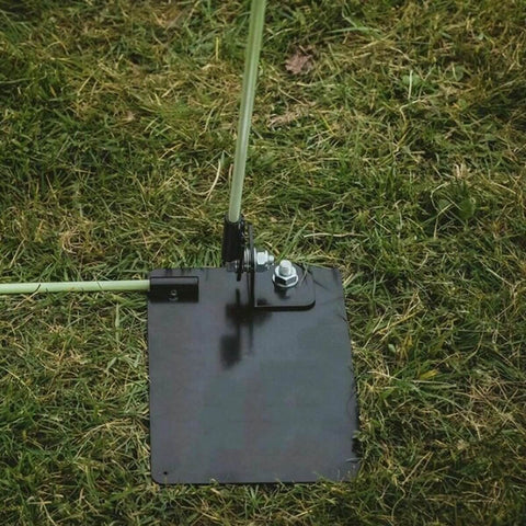 Top view of Durable Steel Golf Swing Plane Trainer Plate With Alignment Stick Holder, Portable Practice Aid for outdoor use.