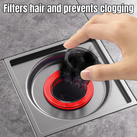 Hand removing hair from Odor Proof Floor Drain With Backflow Preventer And Magnetic One Way Drain Valve For 1.5 To 2.0 Inch Pipes