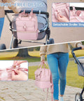 Premium Breast Pump Bag Featuring An Insulated Cooler Compartment For Wearable Pumping Backpack Storage Keeps Bottle Freshness Locked In While Carving Space For All Nursing Essentials And Diaper Gear Is The Ultimate Go To Mom Hack, shown attached to stroller.