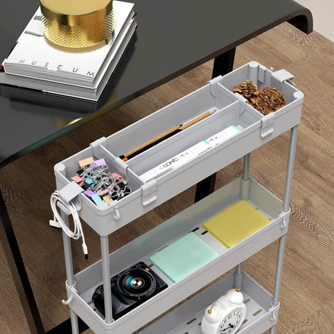 Gray Slim 4 Tier Storage Cart, Rolling Utility Organizer next to desk, showcasing stationery and small items in top tier.