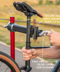 Ultralight Pro Bike Repair Stand secure clamp holding bike seat post with fast slide lock feature, red