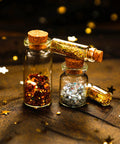 Rad Craft Supply Set Featuring 45 Mini Glass Potion Bottles With Tight Cork Stoppers And Durable Eye Hooks, filled with glitter.
