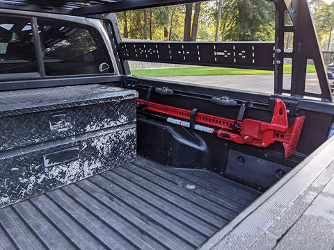 Two Pack High Lift Jack Mount Brackets For Truck Bed Deck Rail System Compatible With Toyota Tacoma 2005 Plus mounted on truck bed.