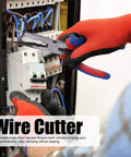 Hand using 45 Steel Wire Cutter Pliers With Insulated Rubber Handle, 10.5 Inch Industrial Tool for electrical repairs on control panel
