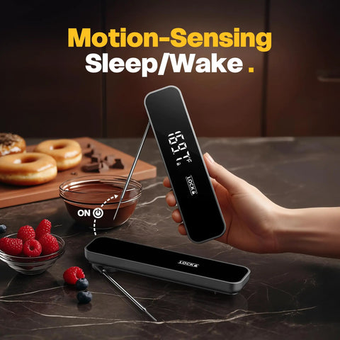 Hand holding Lightning Fast Instant Read Meat Thermometer 0.3S Digital Food Thermometer near desserts, displaying temperature.
