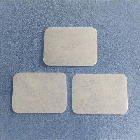 Three folding nylon aircraft hinges 20x25x0.3mm on blue surface, part of 10 Pack Folding Nylon Aircraft Hinges For Aileron Elevator Rudder.