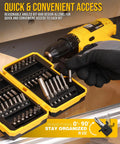 49 Piece S2 Steel Screwdriver Bit Set With Magnetic Driver in yellow non-slip box on workspace with drill visible