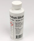 Heavy Duty High Temp Glue That Handles Serious Heat Without Breaking A Sweat Sodium Silicate Water Glass For Ceramic Fiber And Refractory Jobs Forty Percent Clear Formula In A Handy Four Ounce Bottle with label details.