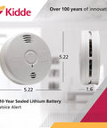 Side and front view of Smarter Smoke Alarm With 10 Year Battery And Photoelectric Sensor White Finish Battery Powered Smoke Detector For Smoldering Fires No Fuss Battery Replacements For A Decade End Of Life Chirp Alerts You.