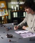 Person assembling Manta Ray 3D Metal Puzzle Kit for Adults with manual and tools