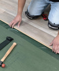 Installing Real Deal 3 In 1 Flooring Underlayment Roll For Laminate And Engineered Wood, 630 sq ft coverage.