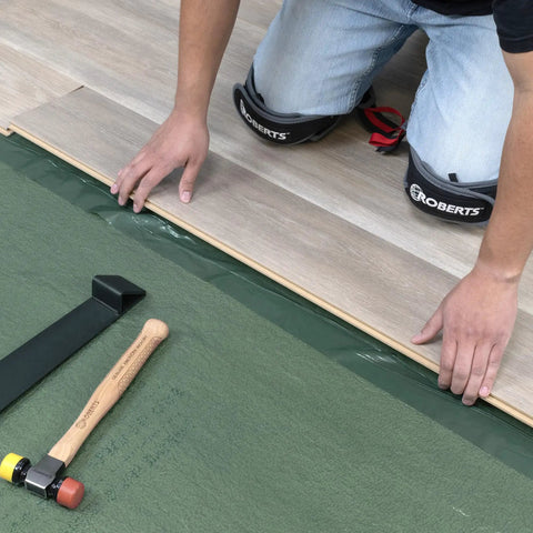 Installing Real Deal 3 In 1 Flooring Underlayment Roll For Laminate And Engineered Wood, 630 sq ft coverage.