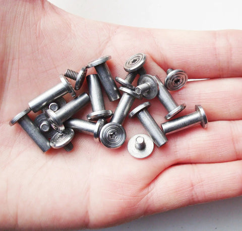 Hand holding Ten Pack Knife Handle Fasteners And Rivets For EDC Pocket Knives, Stainless Steel Bracket Bolts And Tactical Lock Shaft Rivets