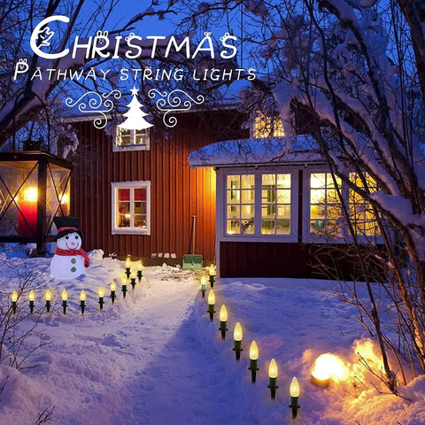 Outdoor Twenty Five Point Seven Feet 20 LED C9 Christmas String Lights With Strawberry Shell Stakes lighting a snowy path