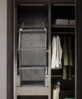 Three Tier Hanging Wardrobe Organizer With Slick Foldable Linen Fabric And Heavy Duty Hooks For Ultimate Closet Space Saving and Dorm Game Changer Essentials in grey, showcasing three compartments in a closet.