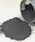 Premium Graphite Powder Seed Flow Lubricant For High Speed Planters And Farm Machinery spilled from 1 lb container on surface