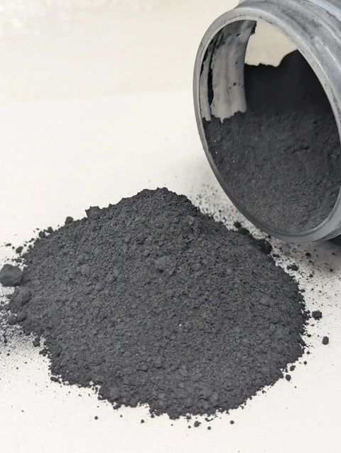 Premium Graphite Powder Seed Flow Lubricant For High Speed Planters And Farm Machinery spilled from 1 lb container on surface