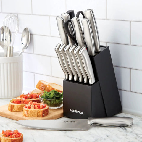 Gotta Have This Knockout 15 Piece Kitchen Knife Set Featuring Hella Sharp High Carbon Stainless Steel Blades in black block with cutting board.