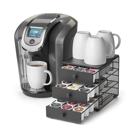 Coffee Pod Drawer For KCups 3 Tier Organizer With 36 Pod Capacity Sleek Black Satin Finish next to coffee machine and mugs.