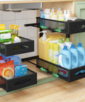 Two Tier Under Sink Organizer With Butter Smooth Mesh Sliding Drawers And Silent Roll Tracks That Make Deep Cabinet Storage A Total Breeze For Quick Every Day Access, showcasing cleaning supplies in sliding black mesh bins.