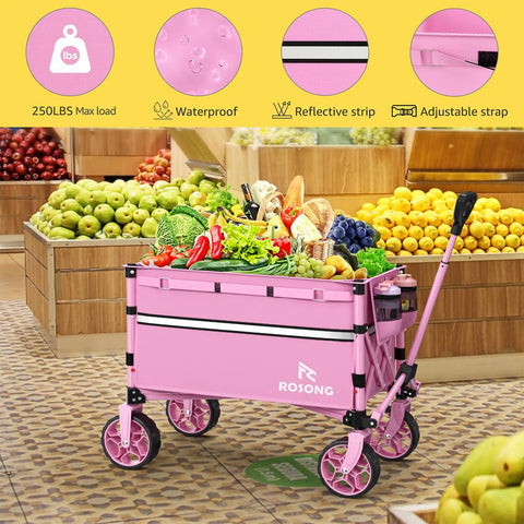 Collapsible Folding Wagon Cart With 360 Degree Wheels And Extendable Handle, Heavy Duty Workhorse Utility Wagon For Grocery, Camping, Garden, Sports Gear, 120L Pink in a grocery setting filled with fruits and vegetables.